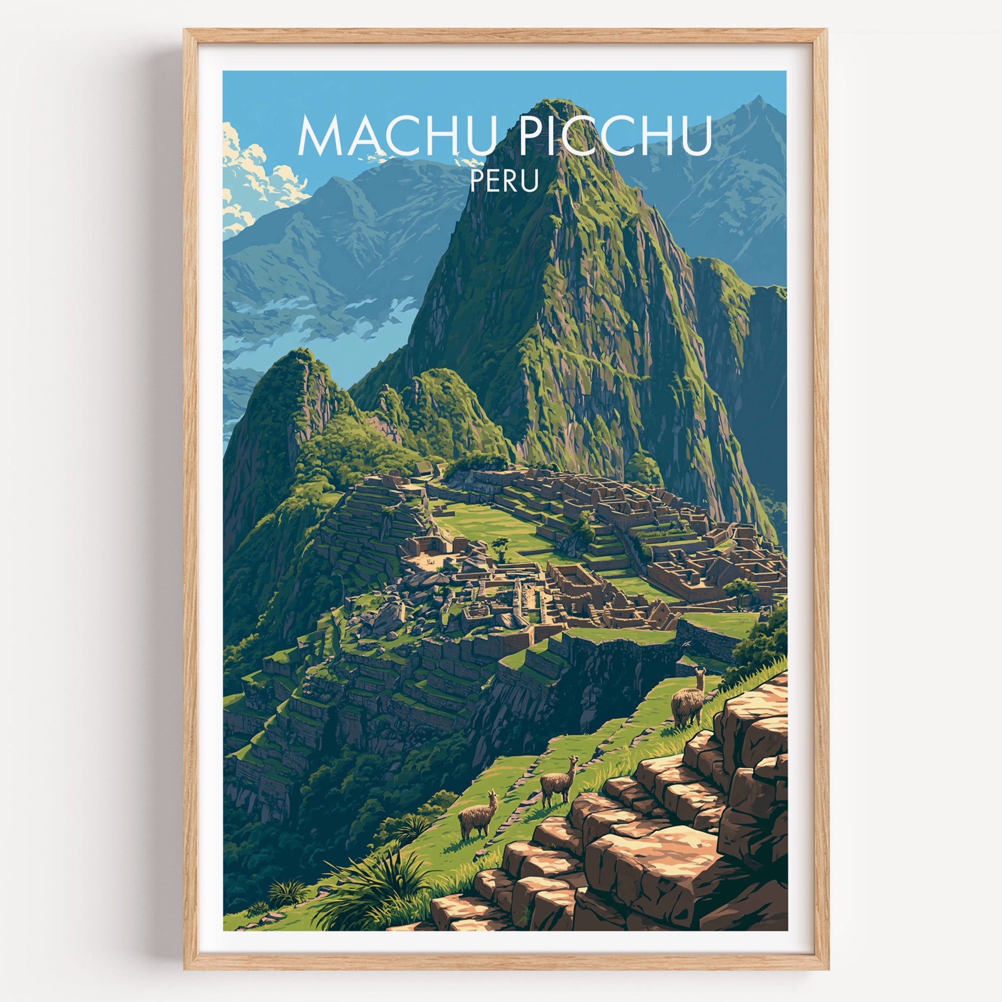 Machu Picchu travel poster of the Inca citadel and Huayna Picchu peak in a light oak frame on a plain white wall