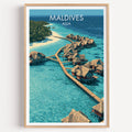 Maldives travel poster in a natural wood frame, shown against a clean white wall