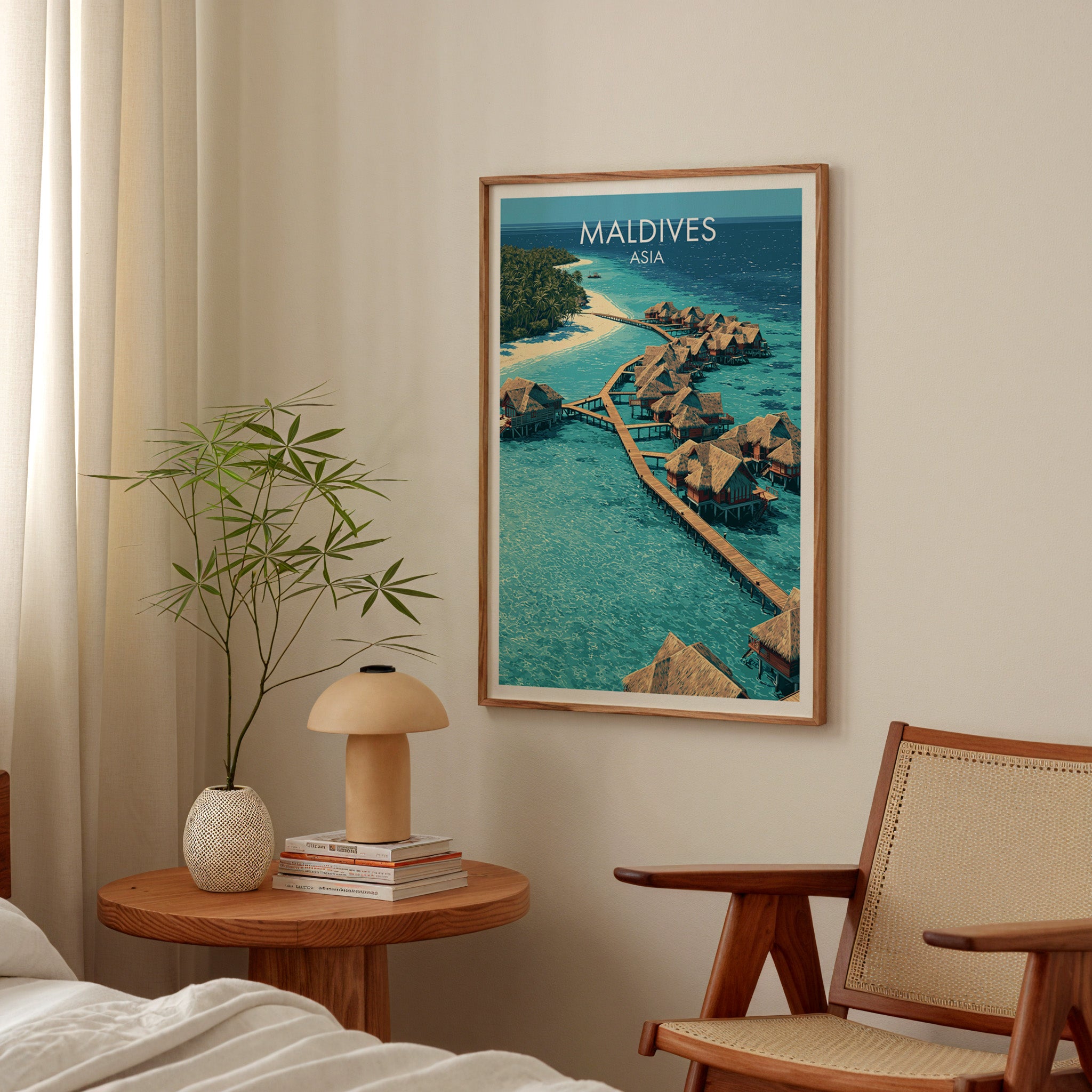 Maldives poster above a bedroom nightstand with a bamboo plant and mushroom lamp
