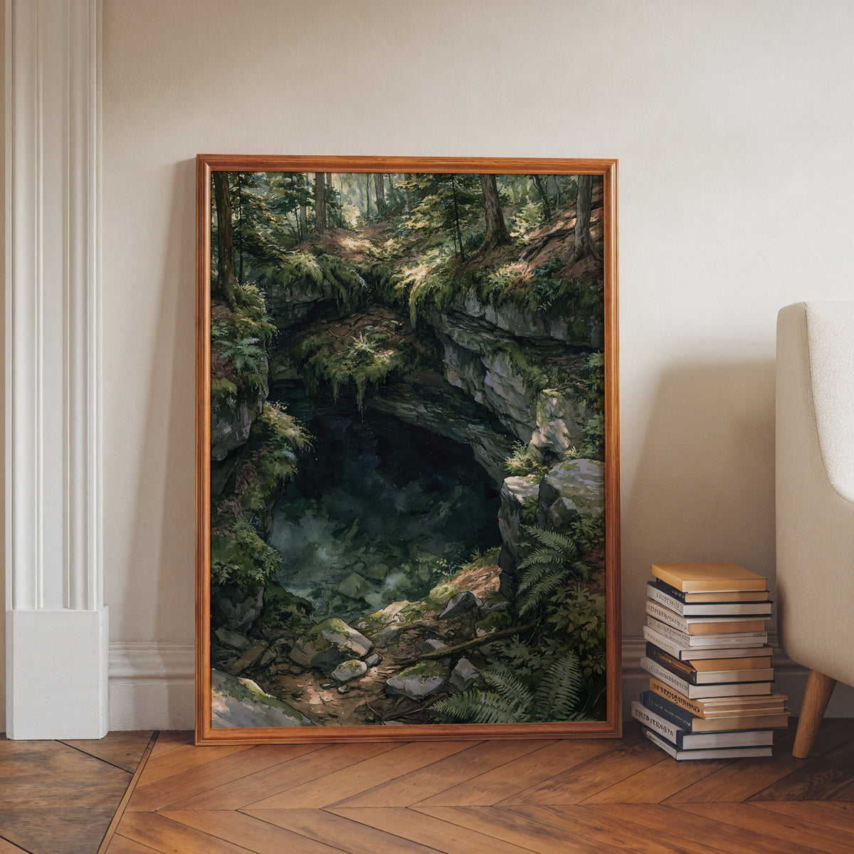 Mammoth Cave National Park watercolor print in a walnut frame leaning on a herringbone floor beside stacked books