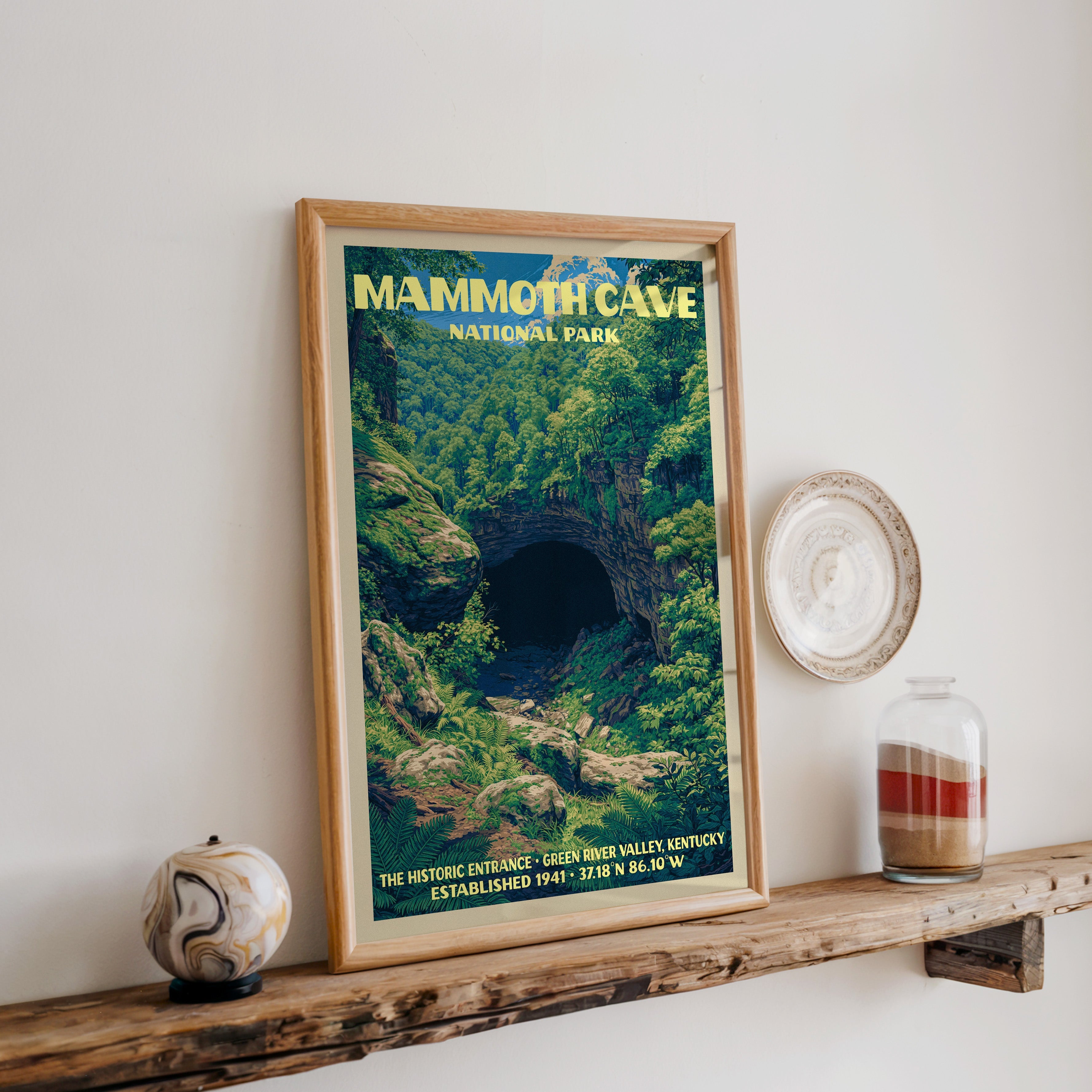 Mammoth Cave Historic Entrance print in oak, leaning on a reclaimed wood ledge with a marbled sphere and sand jar