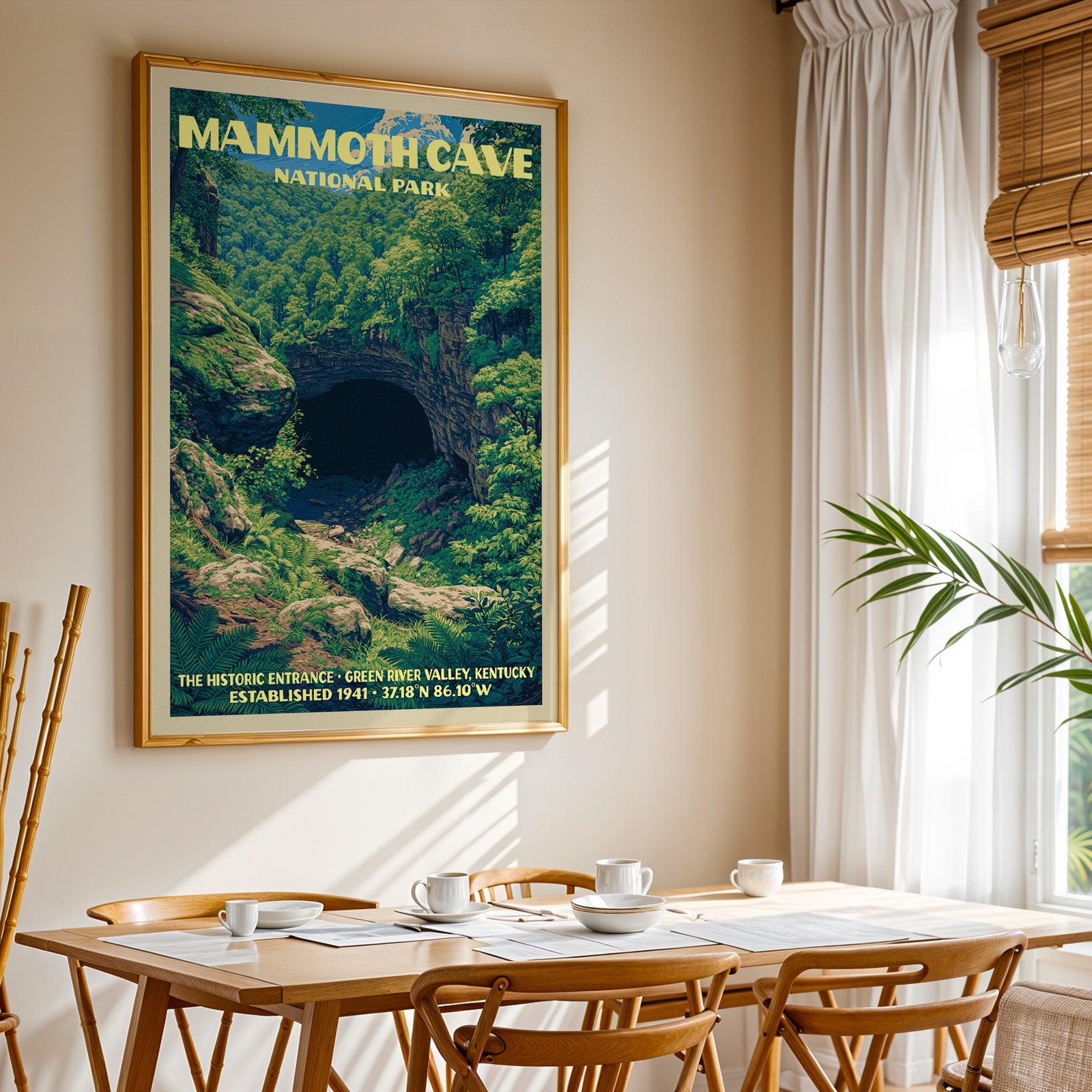 Mammoth Cave National Park print in gold above a light oak dining table by a curtained window