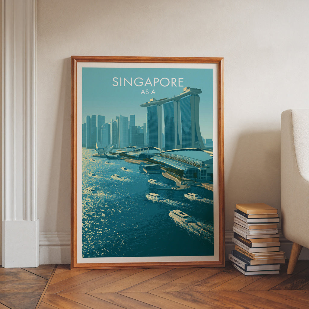 Marina Bay Sands Singapore art print in a walnut frame leaning in a hallway beside stacked books