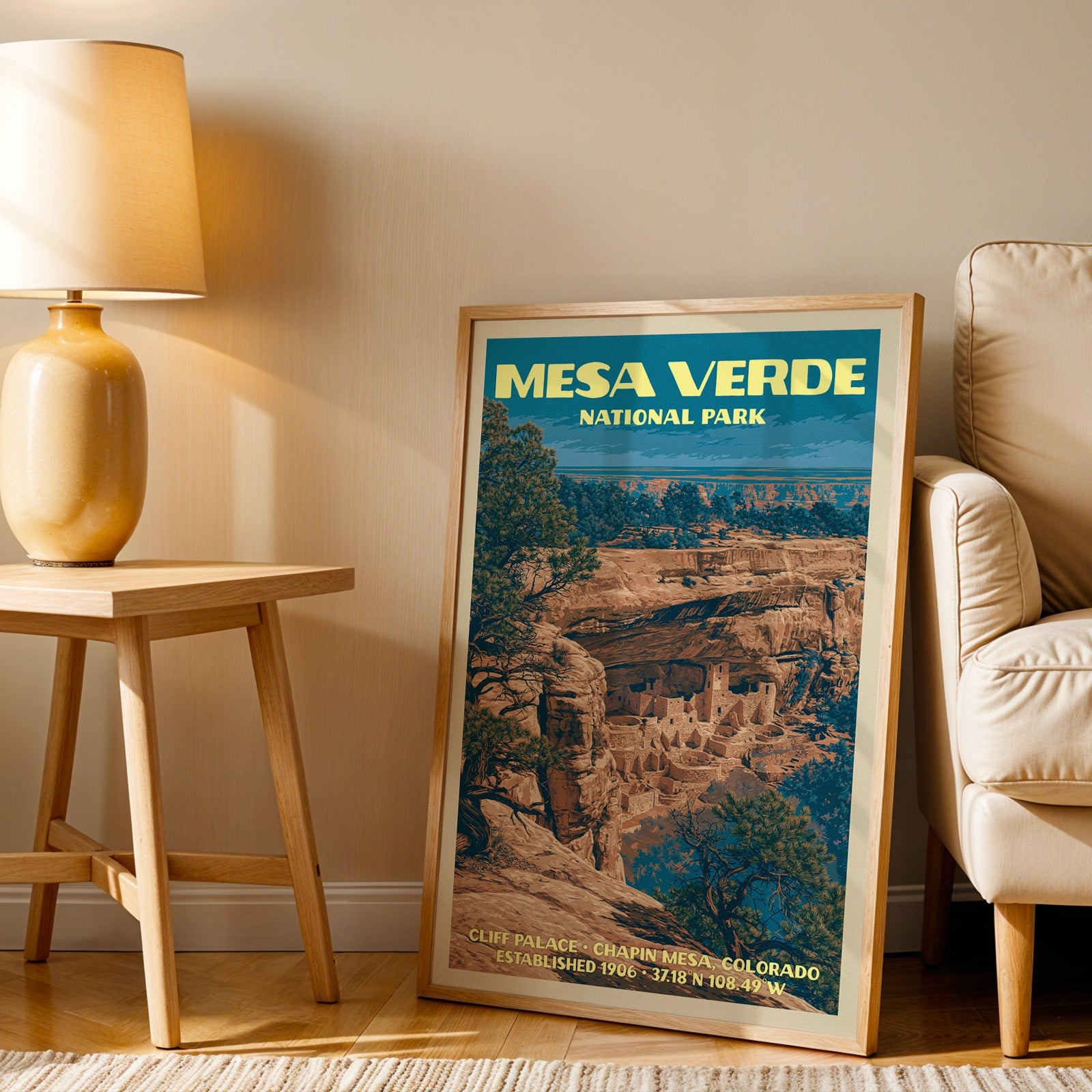 Cliff Palace Mesa Verde wall art in oak, leaning by an armchair and a side table with an ochre ceramic lamp
