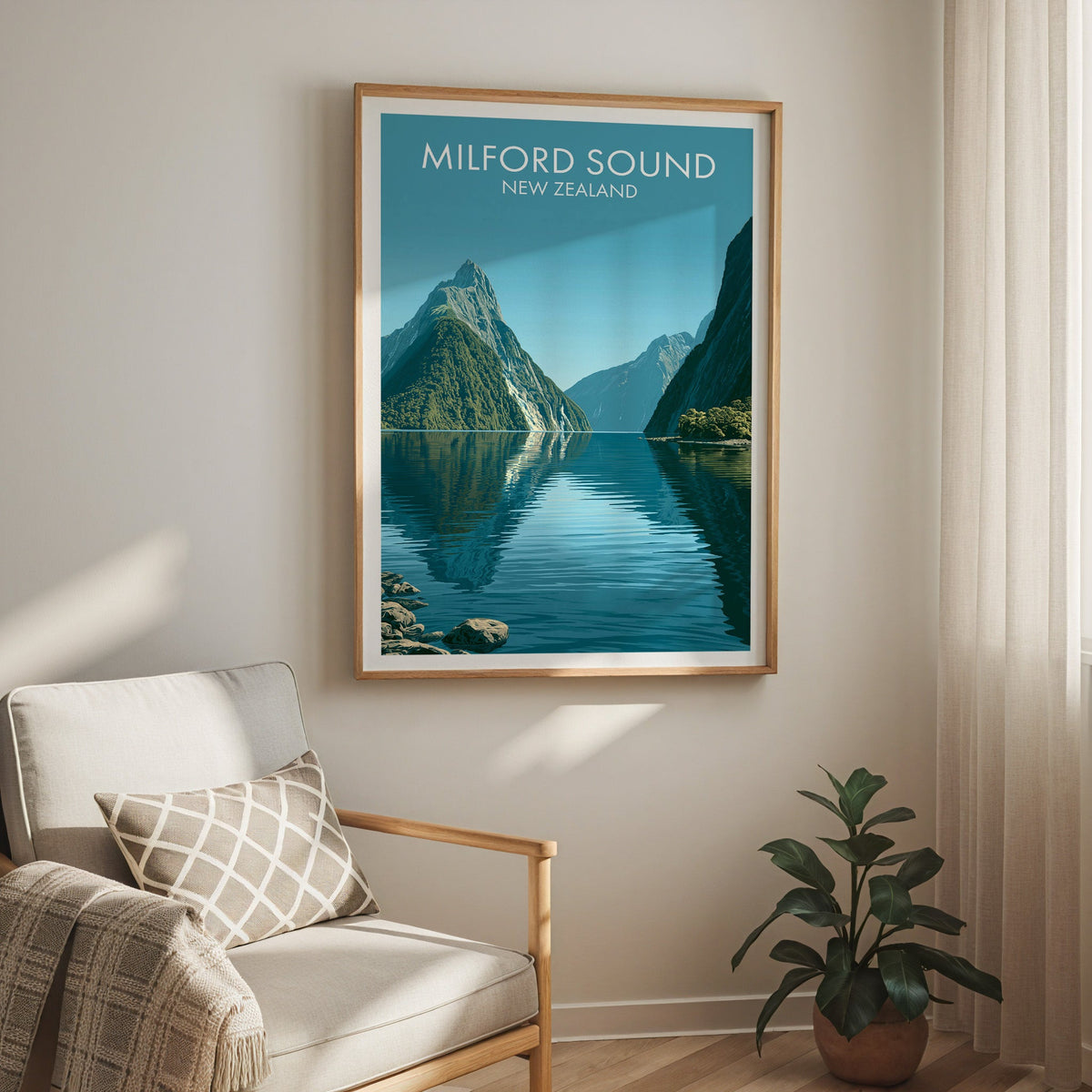 Cool blue fiord print in oak above a cream armchair with a sheer curtain and rubber plant