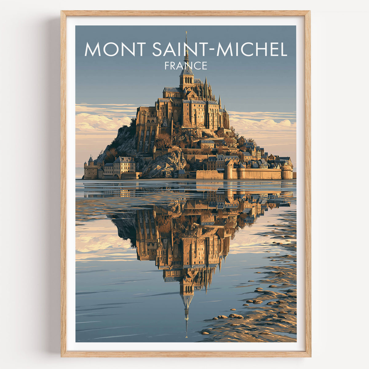 Mont Saint-Michel poster in a light oak frame on a plain white wall
