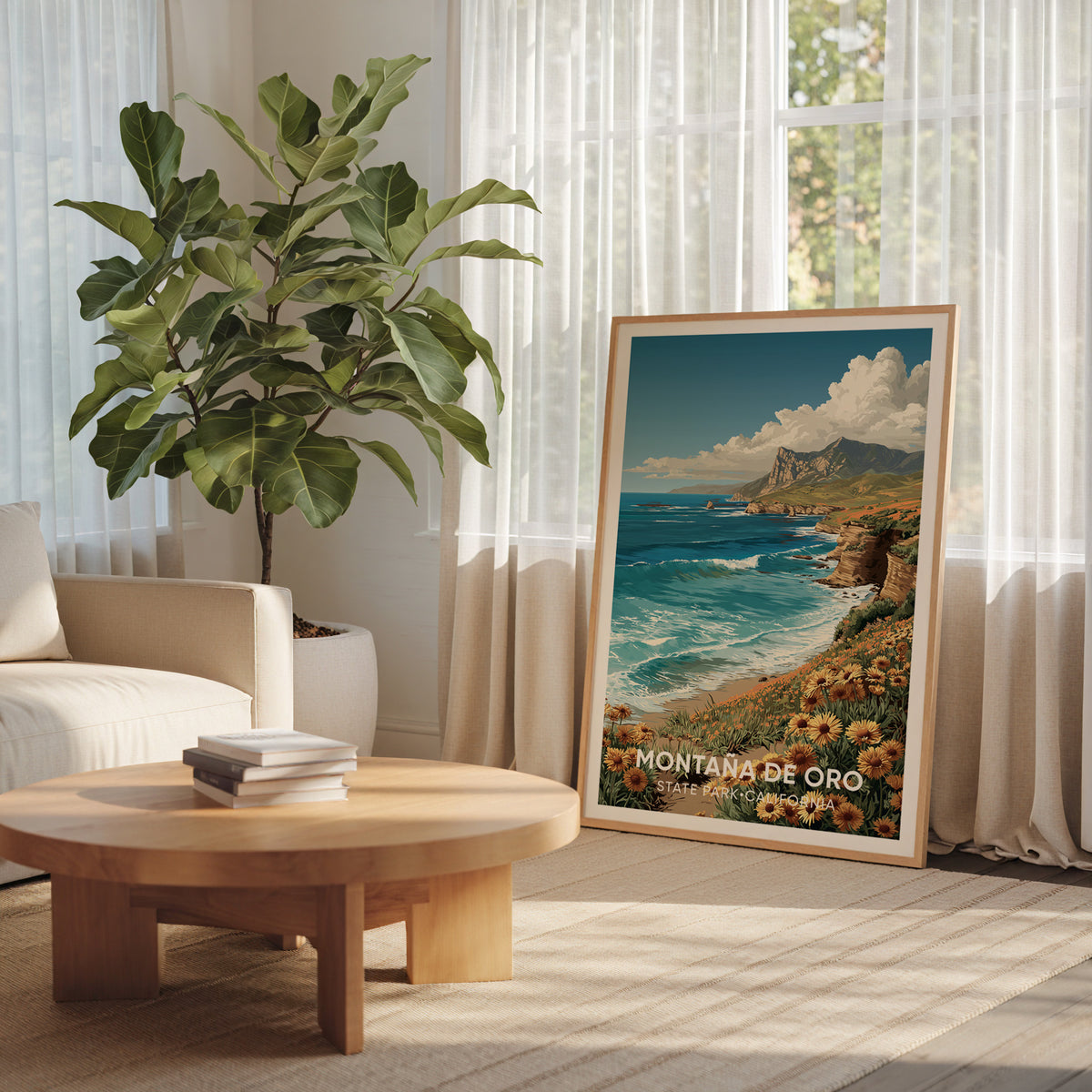 Oak-framed Montana de Oro artwork by a curtained window with a large fan palm and a round wooden coffee table