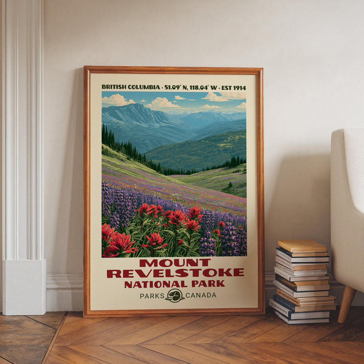 Alpine paintbrush and lupine wall art in a walnut frame on a herringbone floor beside stacked books