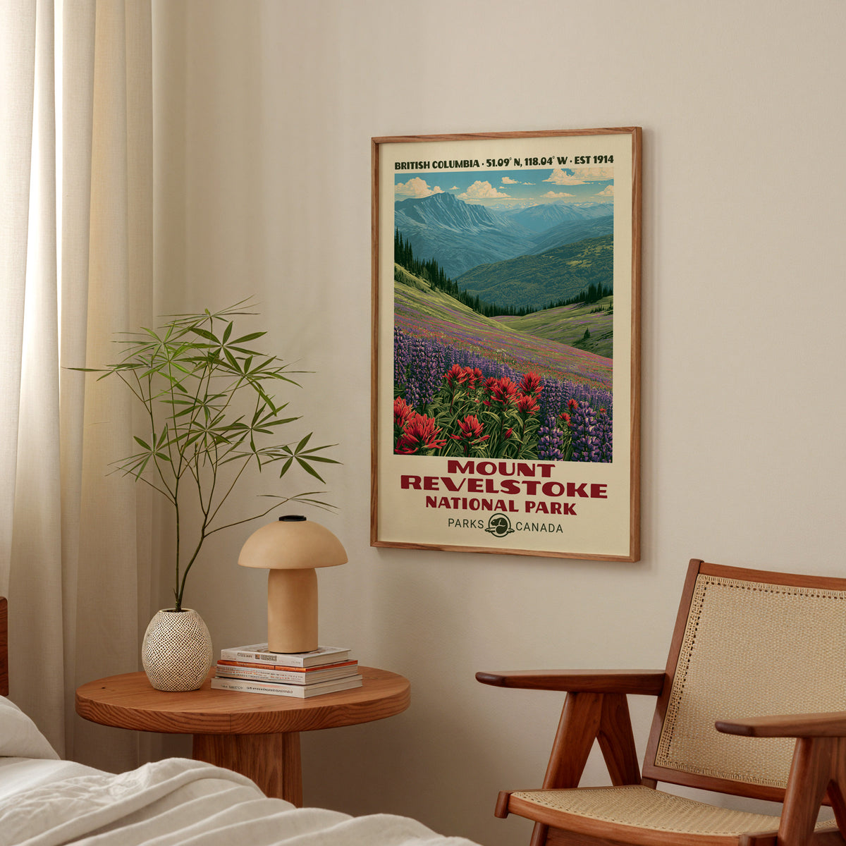 Mount Revelstoke wildflower meadow poster in an oak frame above a bedside table with a mushroom lamp