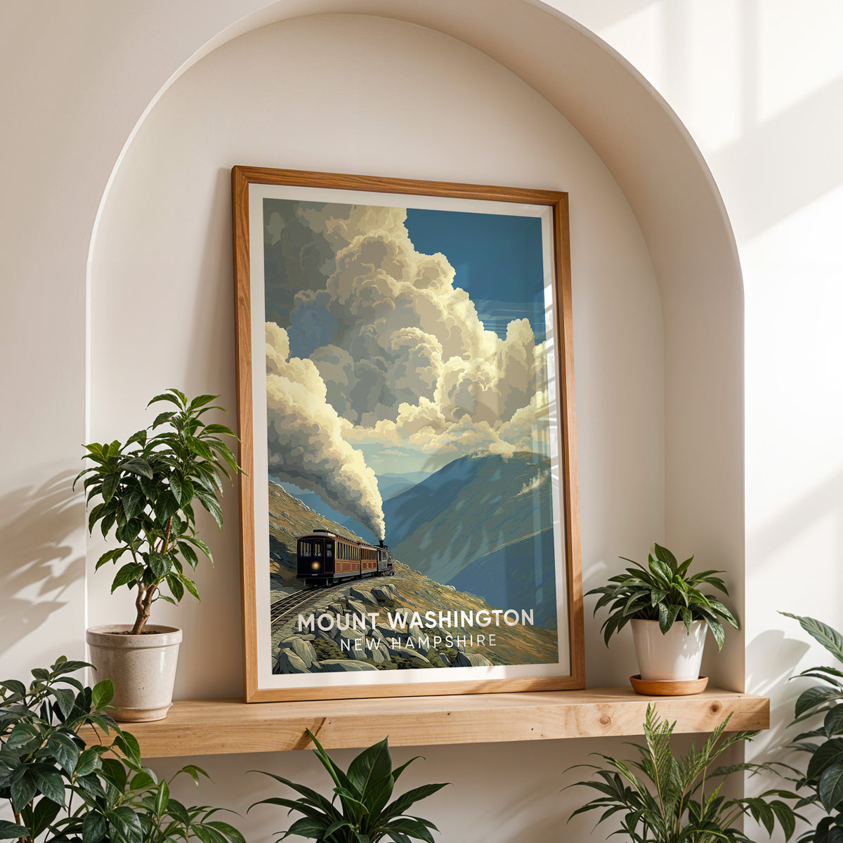 Mount Washington canvas print in an oak frame on a shelf inside a white arched alcove between potted plants