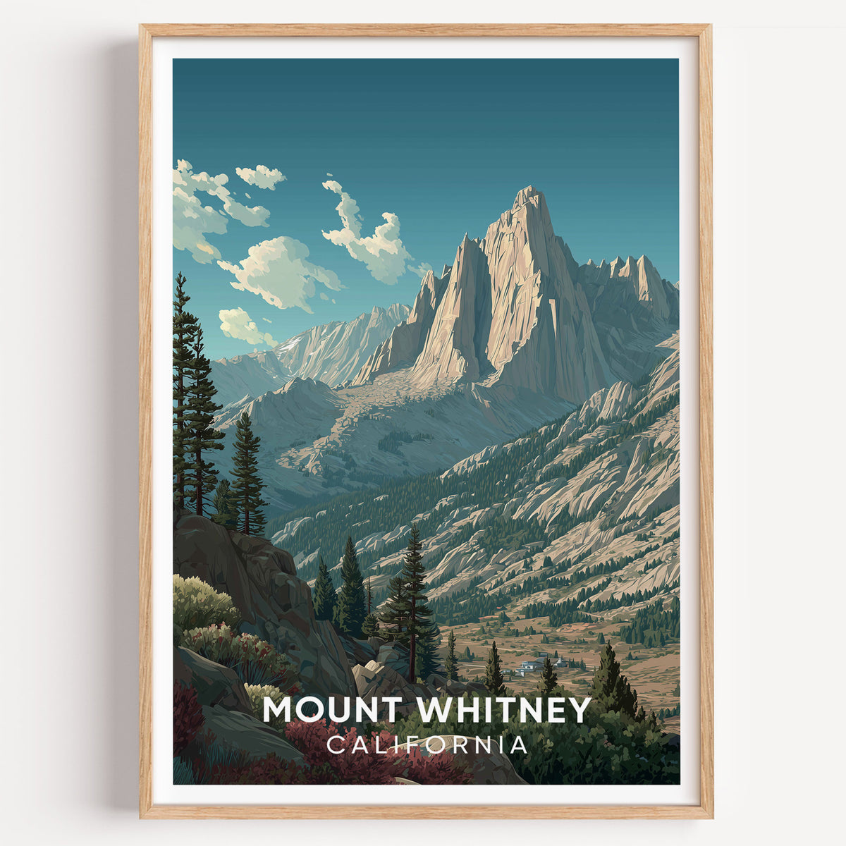 Mount Whitney travel poster in an oak frame on a plain white wall, photographed straight on