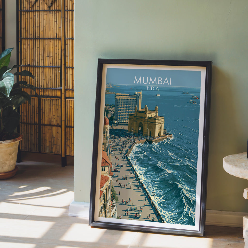 Mumbai India wall art in a black frame leaning against a sage green wall beside a bamboo screen
