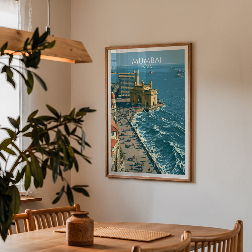 Framed Mumbai India print on a dining room wall above an oak table in warm afternoon light