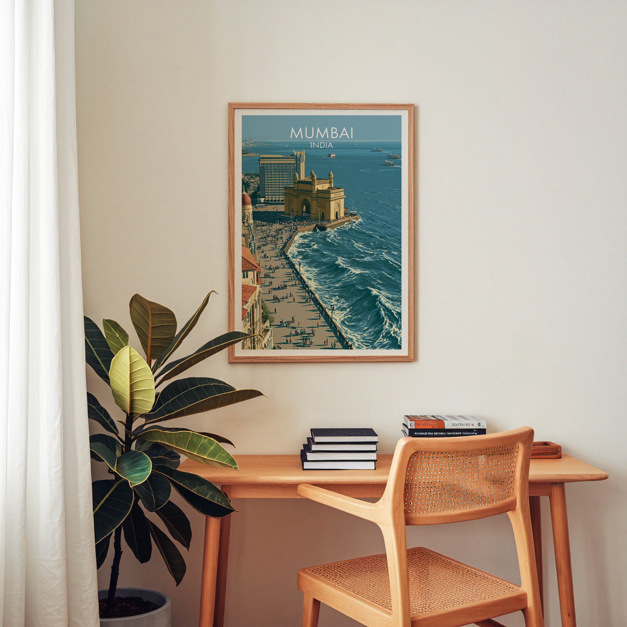 Mumbai India wall art above a wooden home office desk with a rattan chair and books