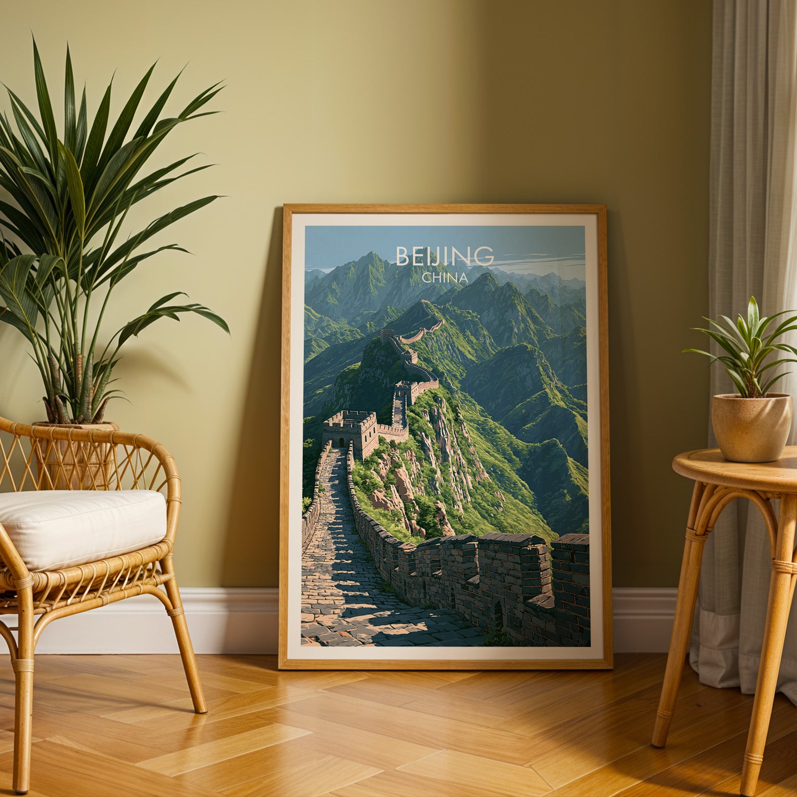 Large Great Wall of China Beijing travel print in an oak frame leaning on a herringbone floor next to a rattan chair