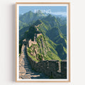 Great Wall of China Beijing travel poster in a natural wood frame, shown against a clean white wall