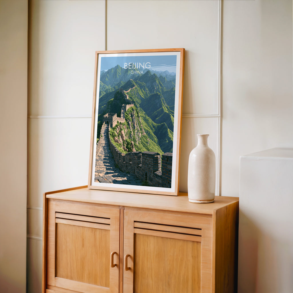 Small Great Wall of China Beijing travel poster in an oak frame on a mid-century sideboard with a ceramic vase