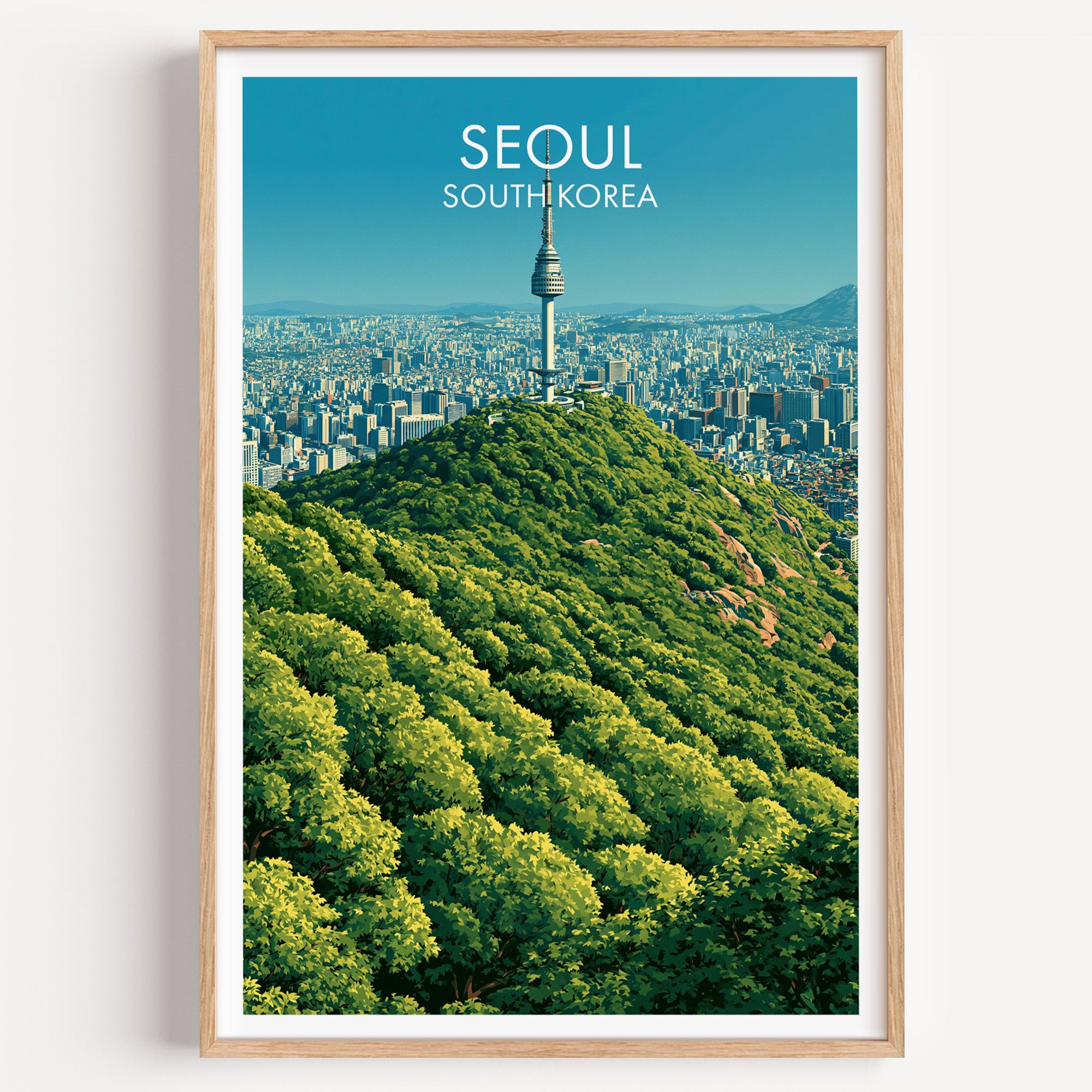 N Seoul Tower Seoul Korea travel poster in a natural wood frame, shown against a clean white wall