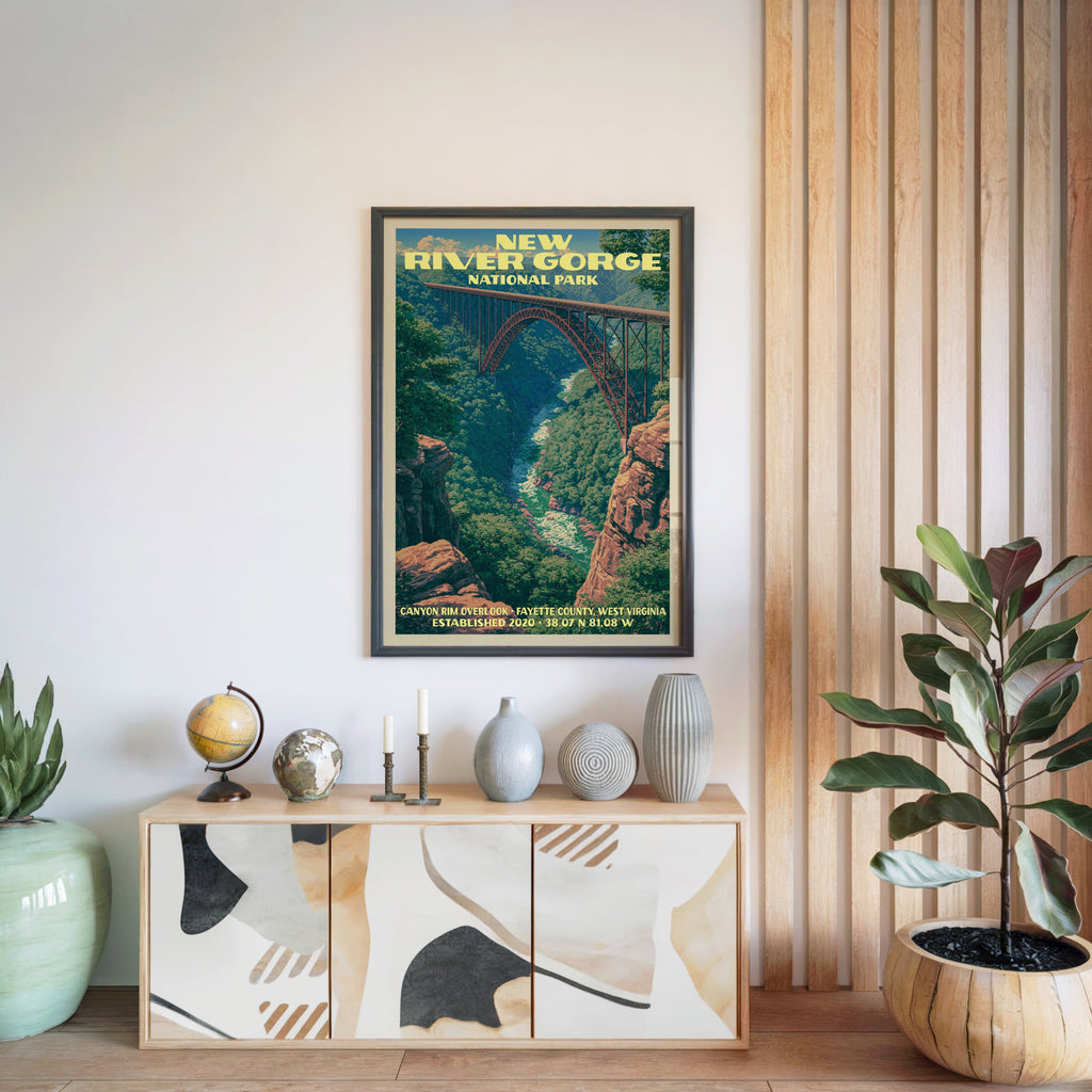 New River Gorge National Park poster in a black frame above a light wood sideboard by a slatted wall panel