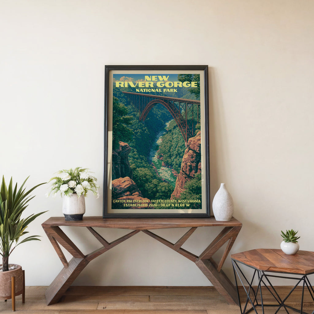 New River Gorge bridge wall art in black, leaning on a walnut console with white anemones and a vase