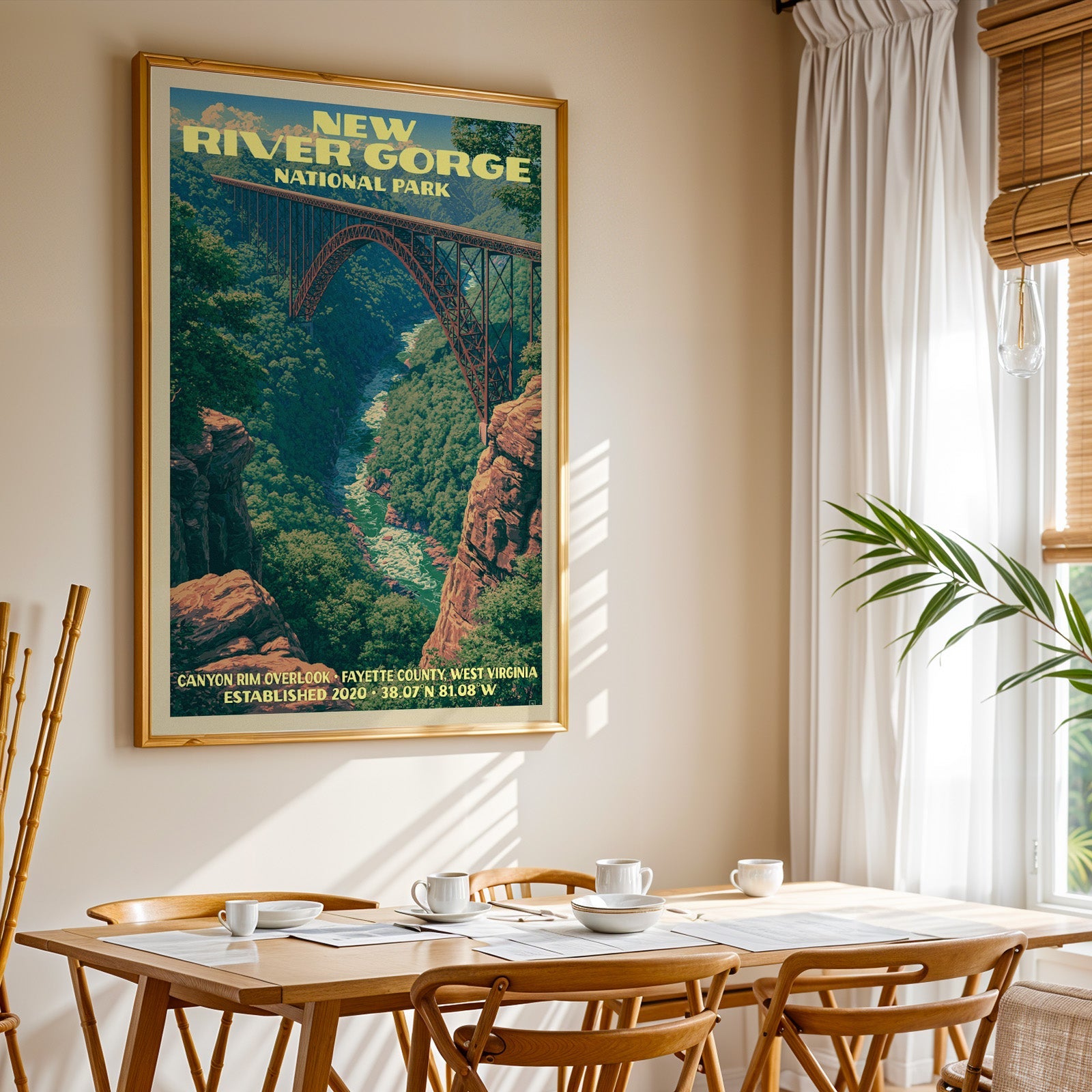 New River Gorge National Park print in gold above a light oak dining table by a curtained window