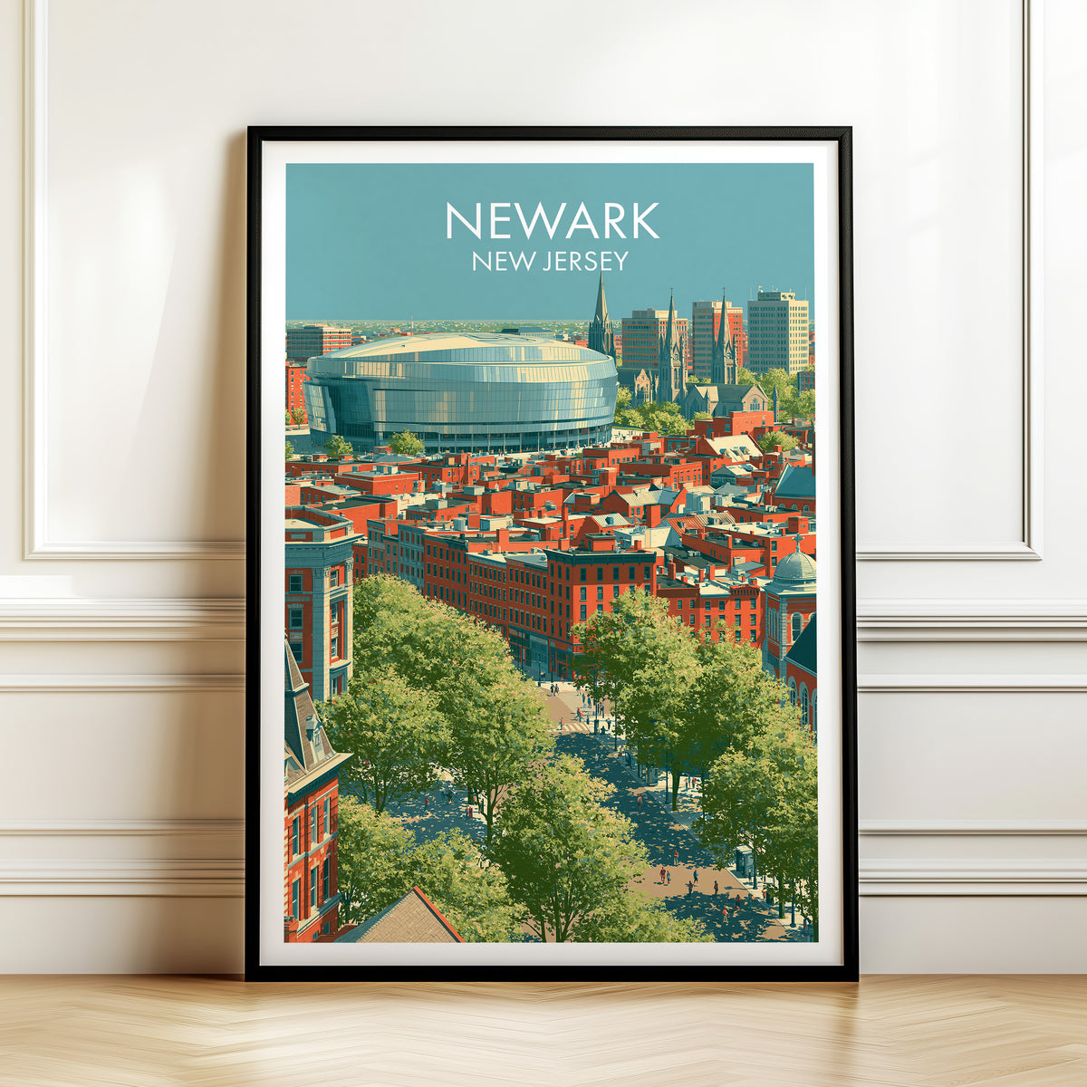 Newark downtown print in a black frame leaning on a white panelled wall above a herringbone wood floor