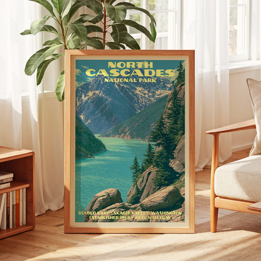 North Cascades vintage poster in oak, leaning by a sunlit window with sheer curtains and a low bookshelf