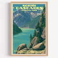 Diablo Lake North Cascades vintage poster in a light oak frame on a plain white wall