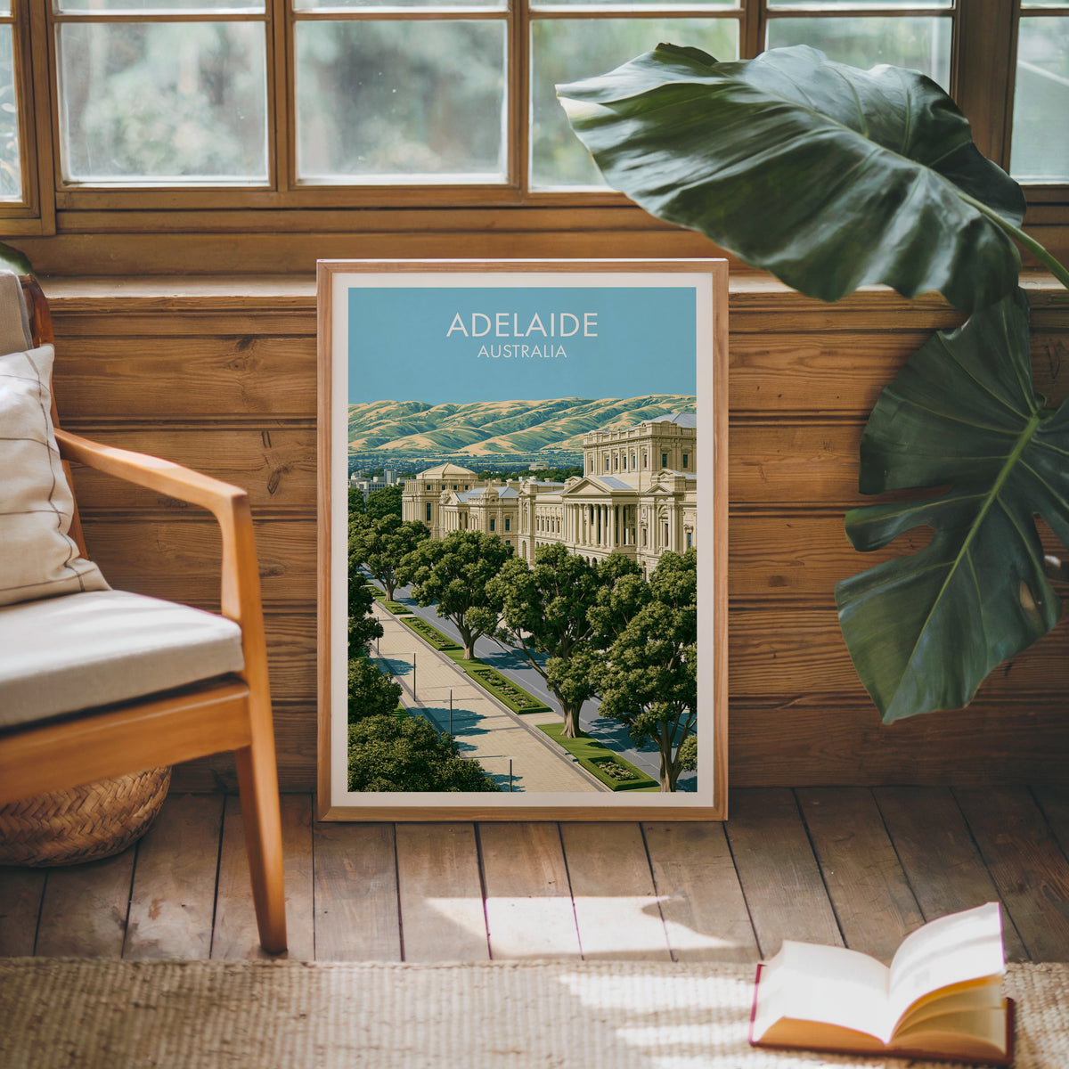 Heritage architecture artwork in an oak frame on a pine cabin wall with a wooden armchair and jute rug