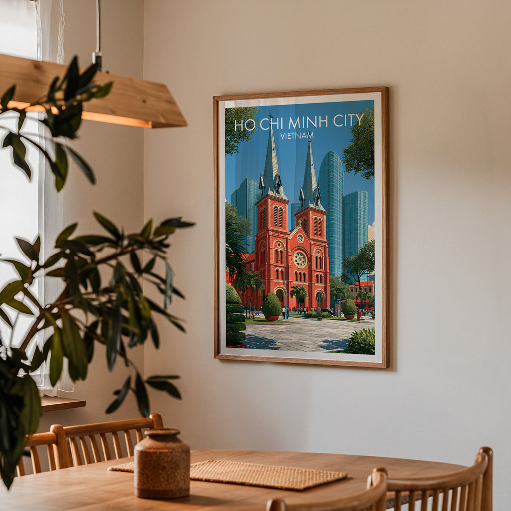 Framed Ho Chi Minh City Vietnam print on a dining room wall above an oak table in warm afternoon light
