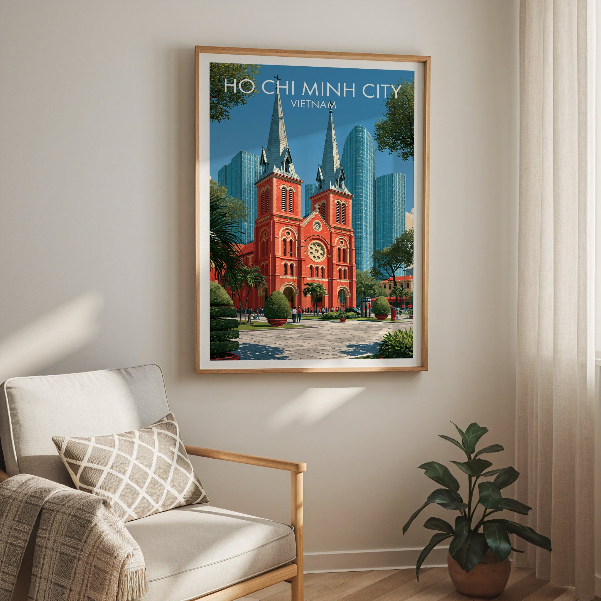 Ho Chi Minh City Vietnam travel print in a light oak frame on a living room wall beside a linen armchair