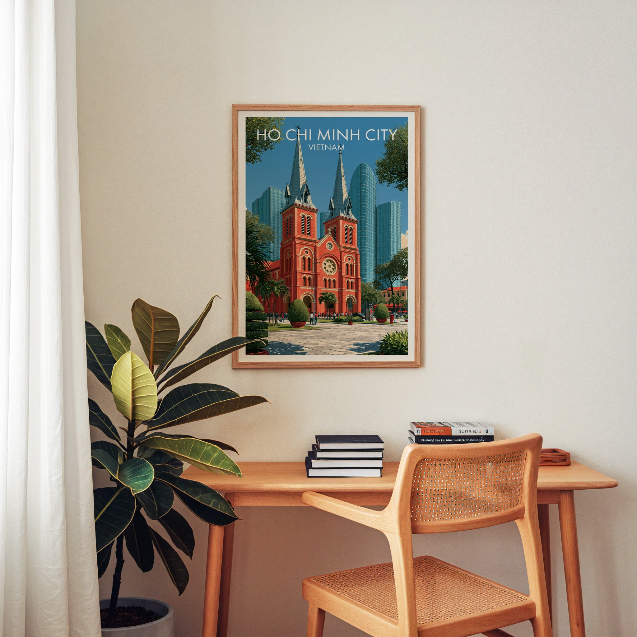 Ho Chi Minh City Vietnam wall art above a wooden home office desk with a rattan chair and books