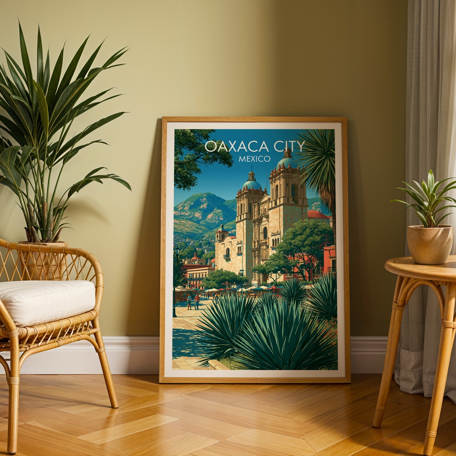 Bottle-green agave and cobalt sky in an oak frame on herringbone parquet, rattan chair and olive wall