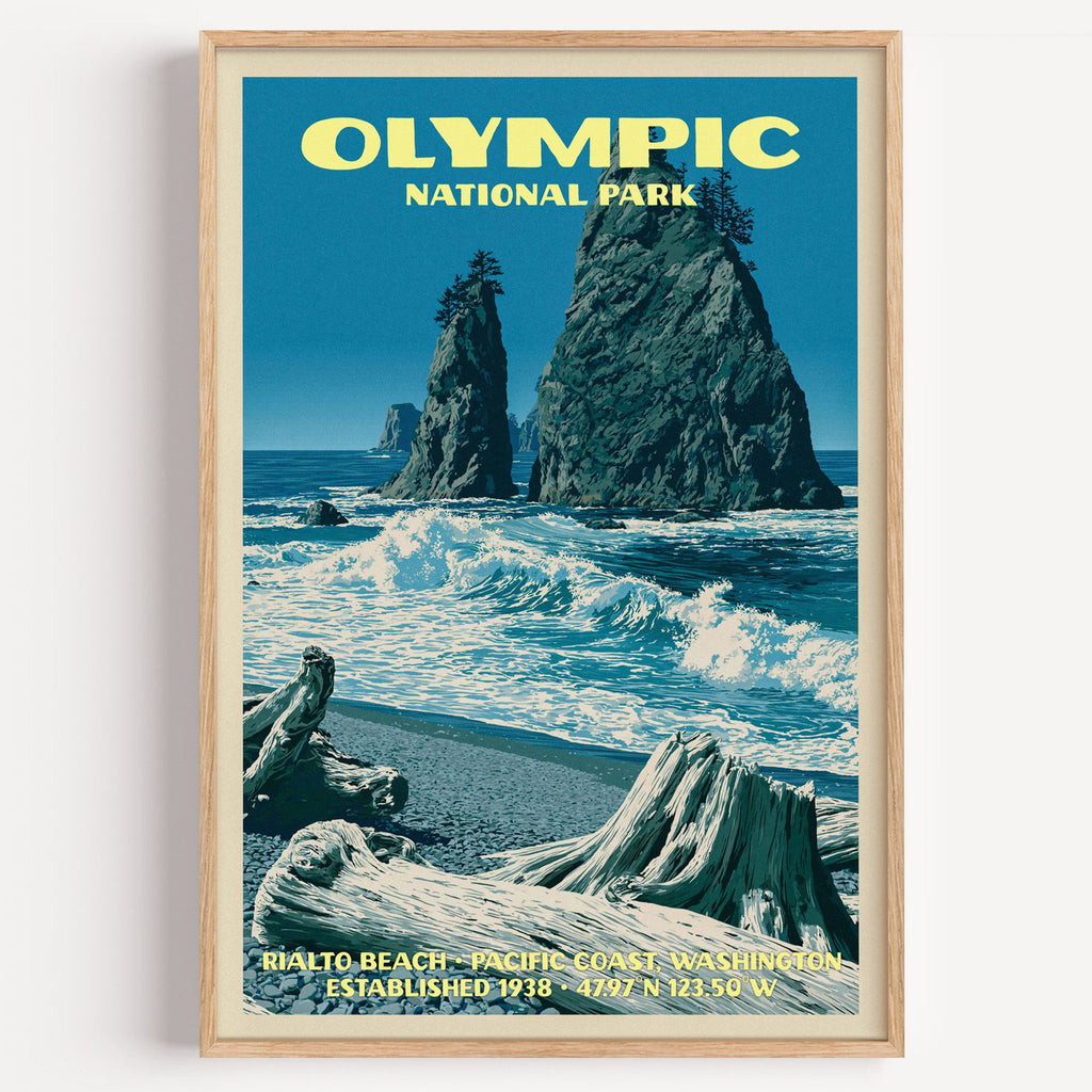 Rialto Beach Olympic National Park vintage poster in a light oak frame on a plain white wall