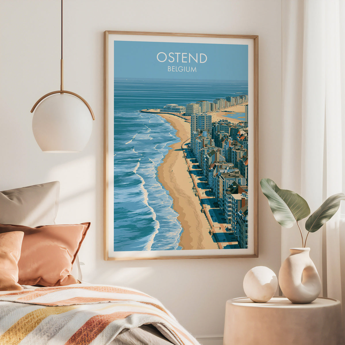 Ostend Belgium wall art, large oak frame above a bed with rust bedding and a brass globe pendant
