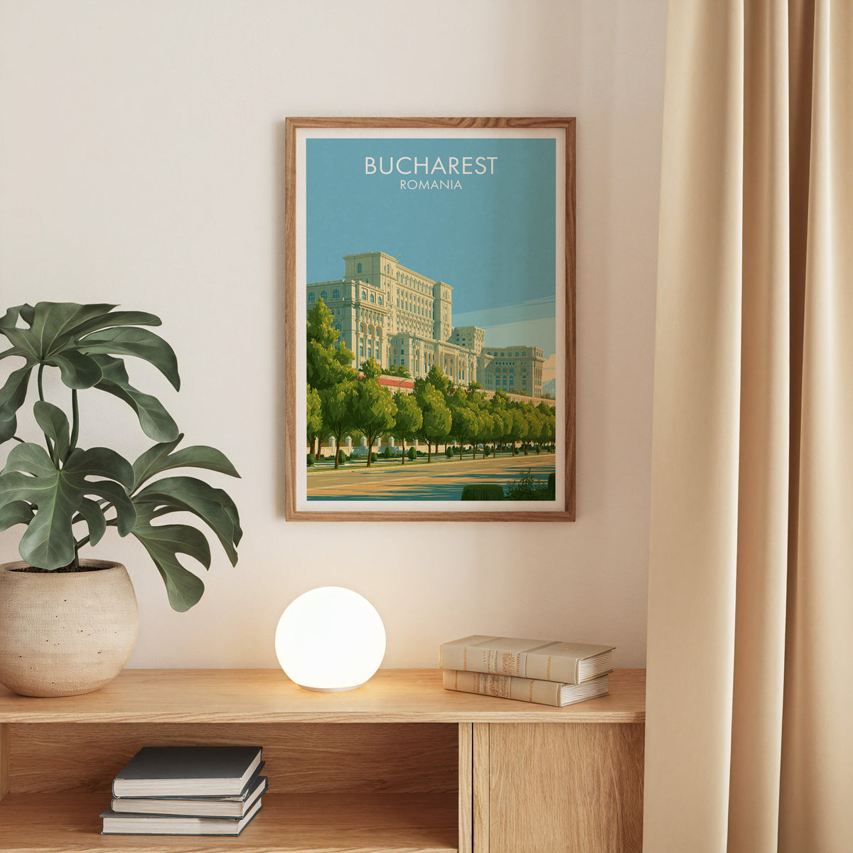 Palace of Parliament print, oak frame above an oak console with a monstera and a round globe lamp