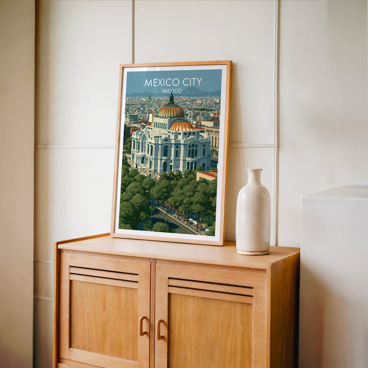 Ribbed dome and arched windows in an oak frame on a light oak cabinet by a cream panelled wall