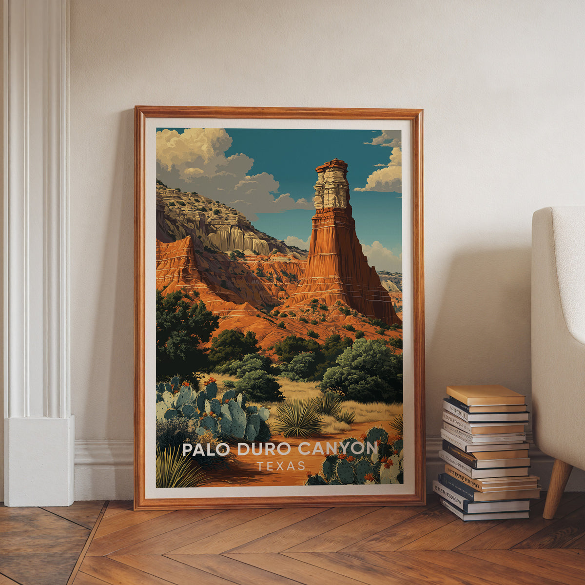 Lighthouse formation print in a walnut frame leaning on a white wall above a herringbone floor