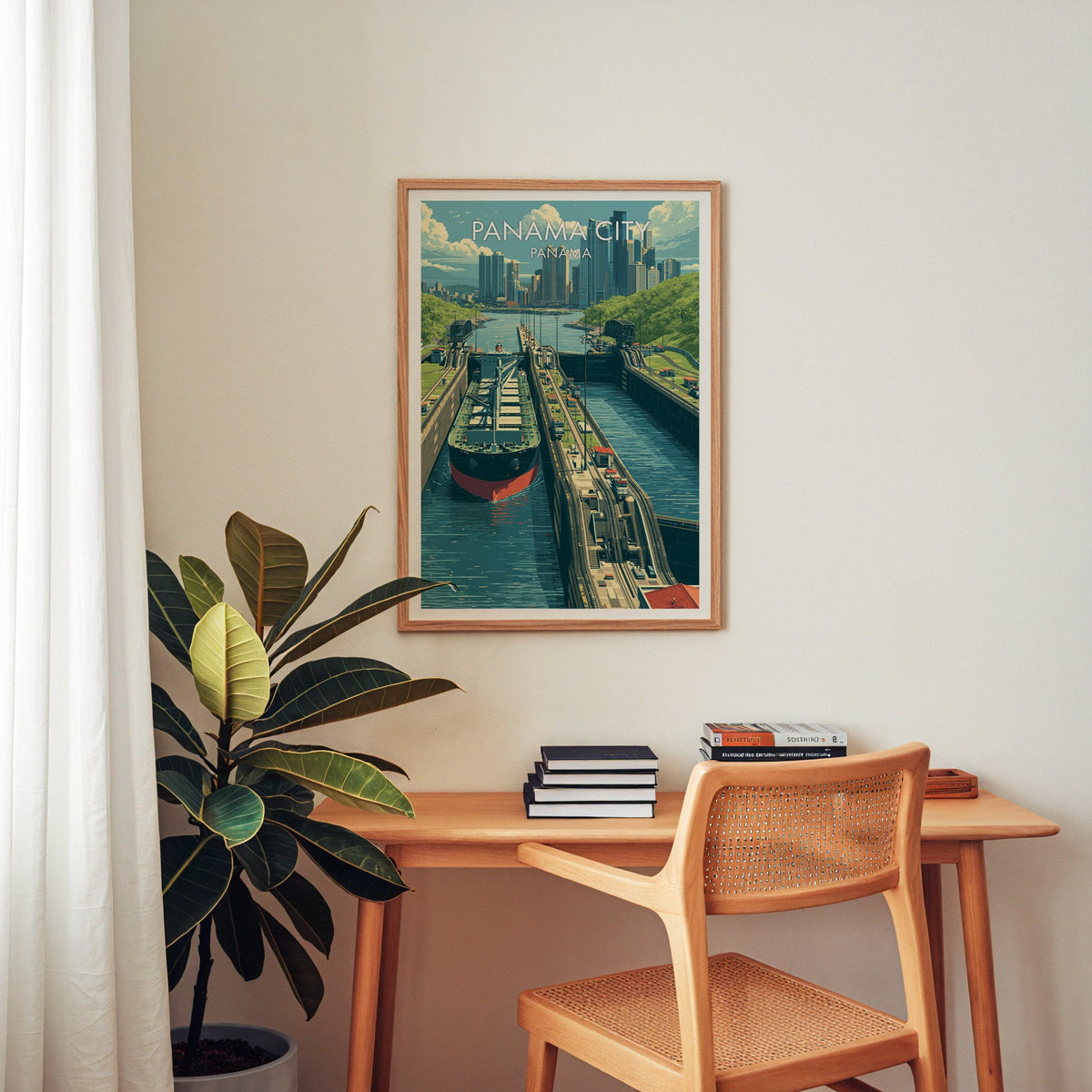 Canal engineering artwork in an oak frame above a wooden desk with a cane chair and rubber plant