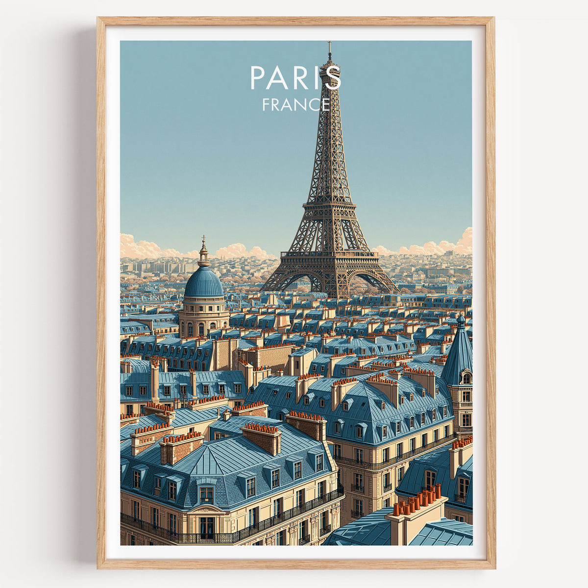 Paris rooftops poster in a light oak frame on a plain white wall