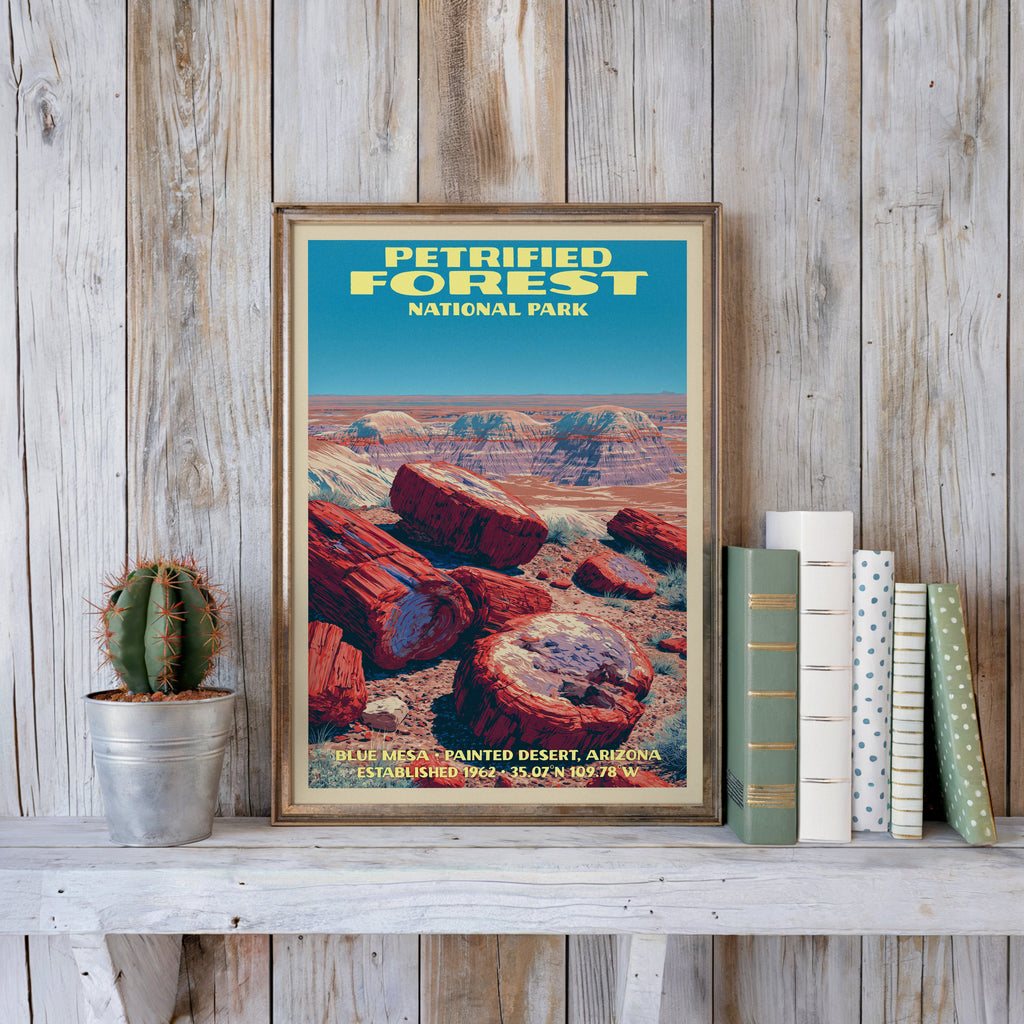 Petrified Forest vintage poster in a slim gold frame on a whitewashed plank wall beside a cactus and pastel books