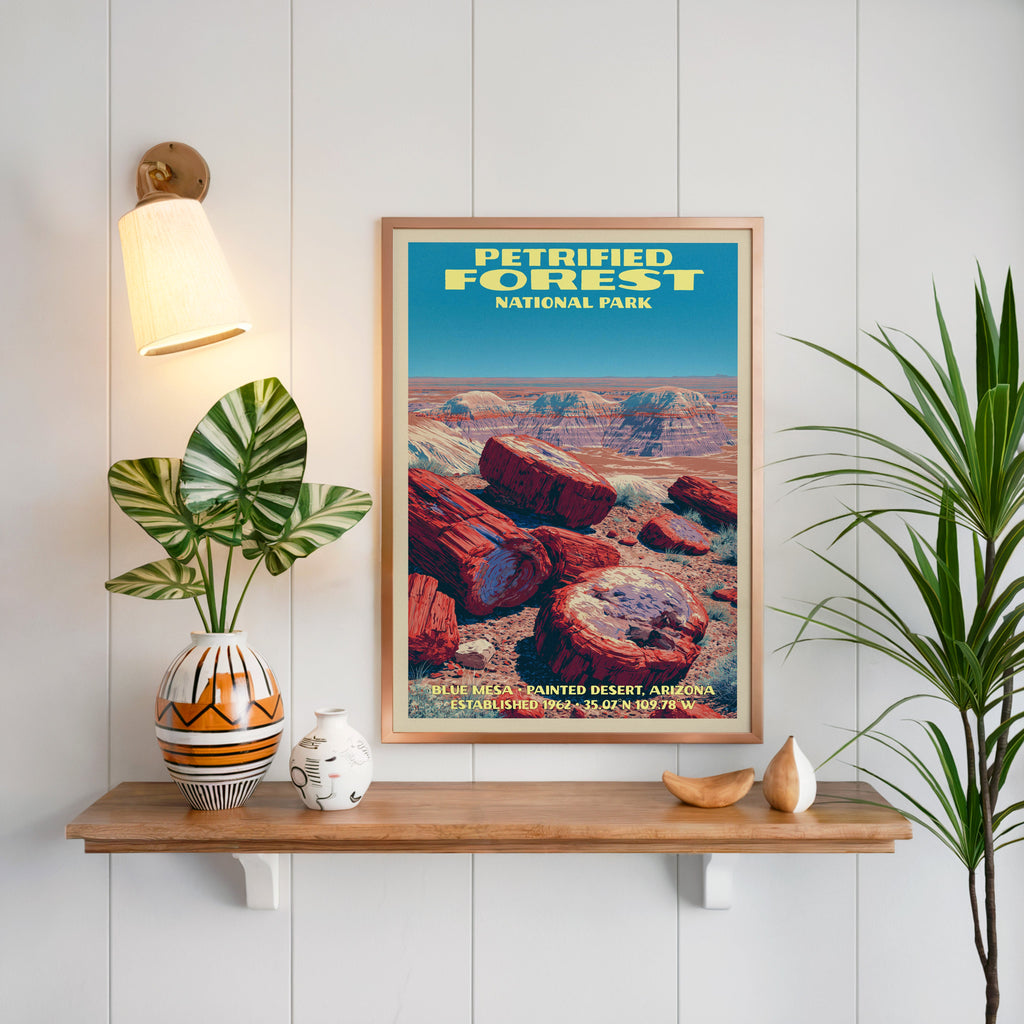 Blue Mesa Petrified Forest print framed on white panelling above an oak shelf with a patterned vase and sconce