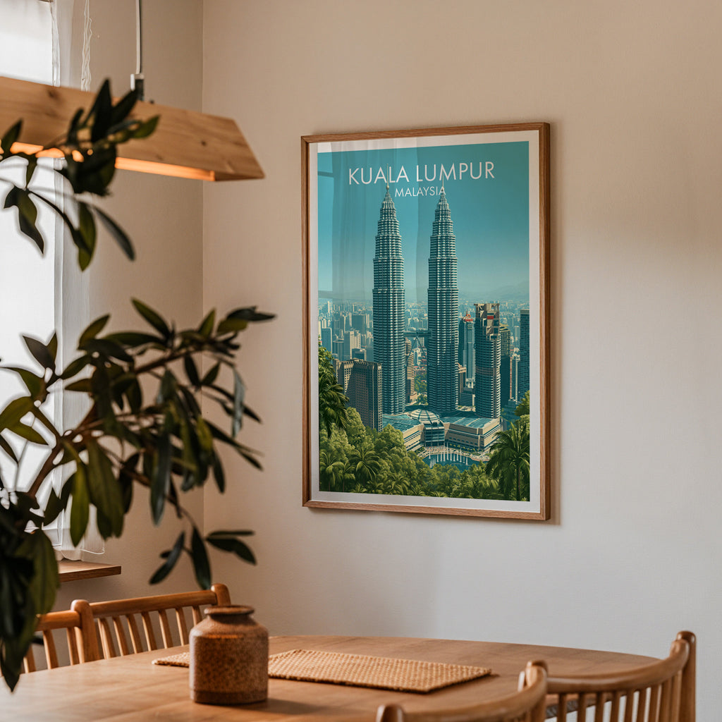 Framed Petronas Towers Kuala Lumpur print on a dining room wall above an oak table in warm afternoon light