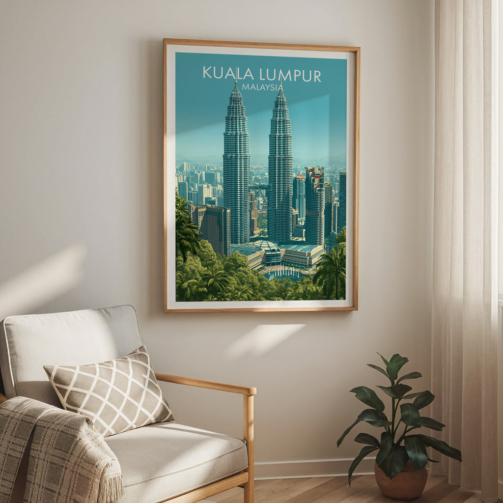 Petronas Towers Kuala Lumpur travel print in a light oak frame on a living room wall beside a linen armchair