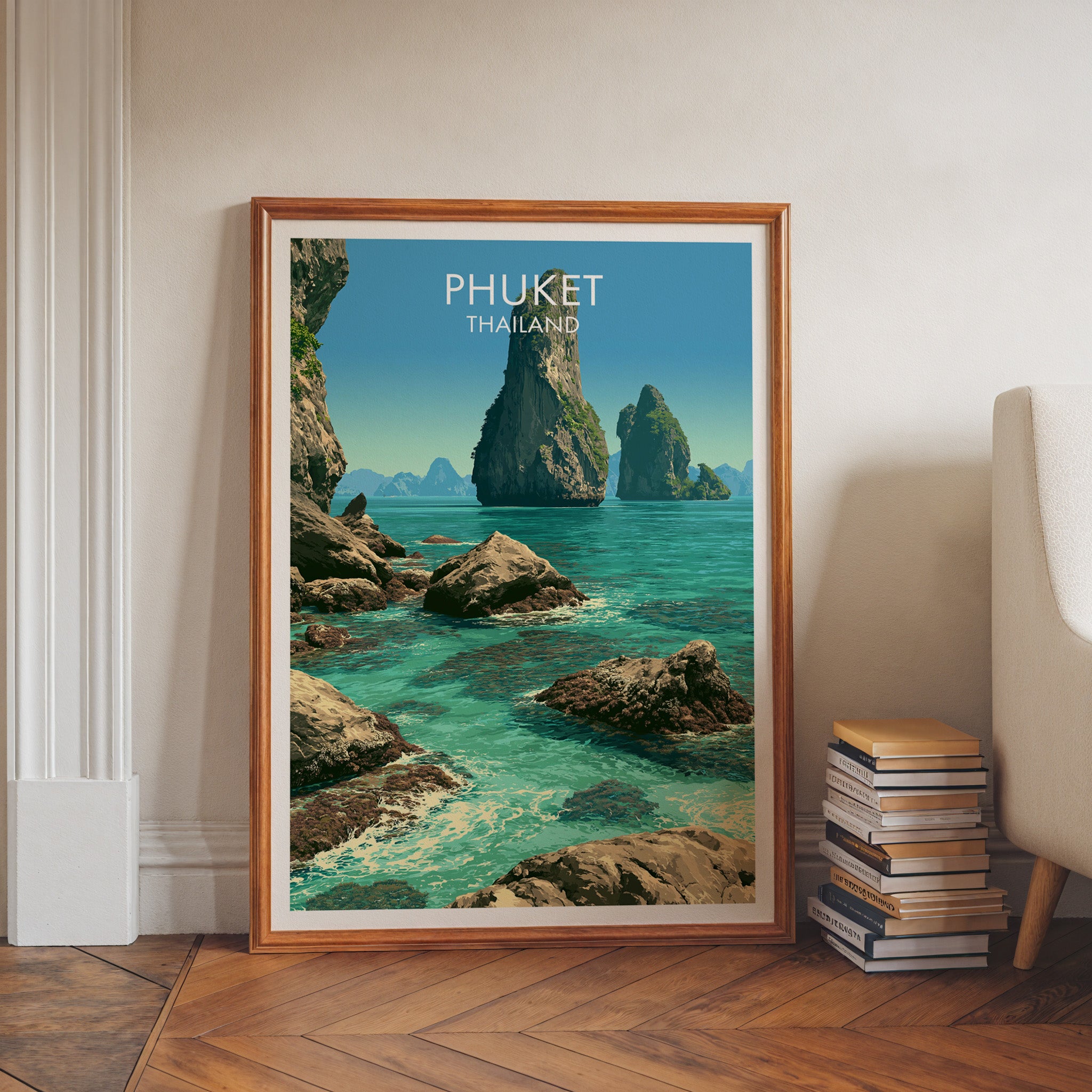 Phang Nga Bay Phuket Thailand art print in a walnut frame leaning in a hallway beside stacked books