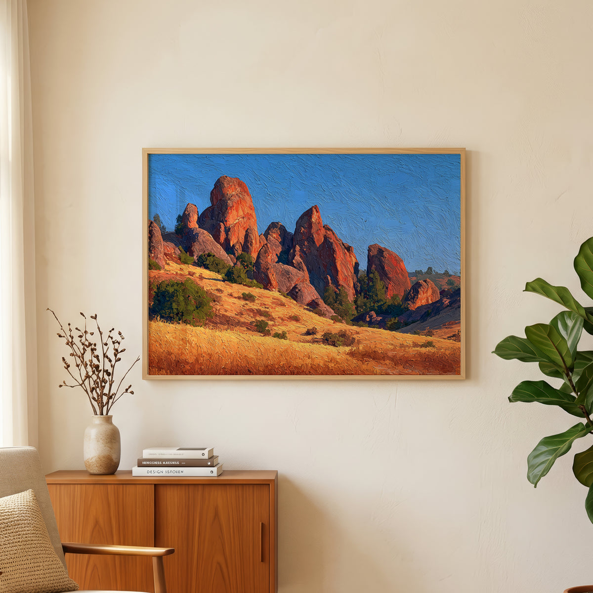 Pinnacles National Park oil painting wall art above an oak and rattan sideboard with a lamp