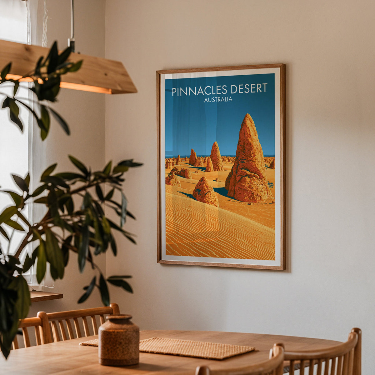 Limestone pinnacle wall art in a dining corner above an oak table with spindle chairs and a pendant light