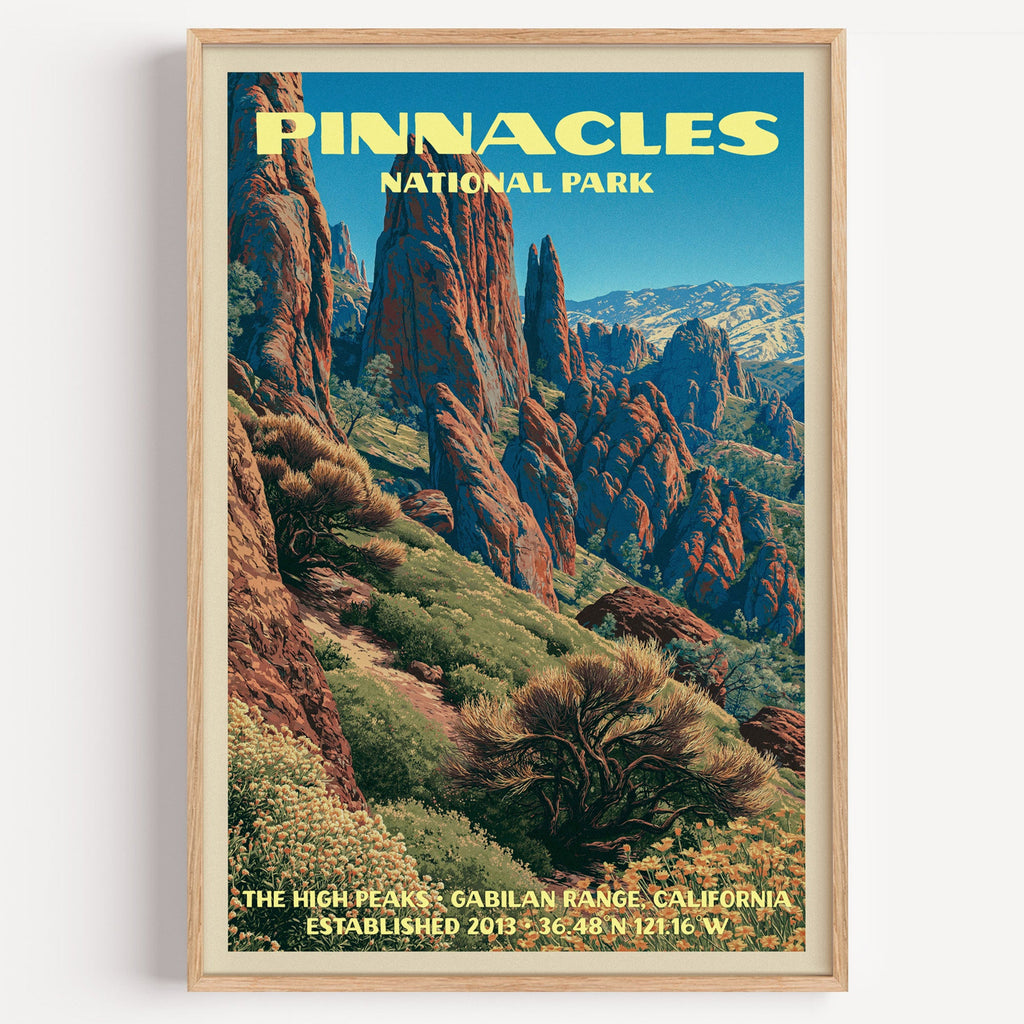 High Peaks Pinnacles National Park vintage poster in a light oak frame on a plain white wall