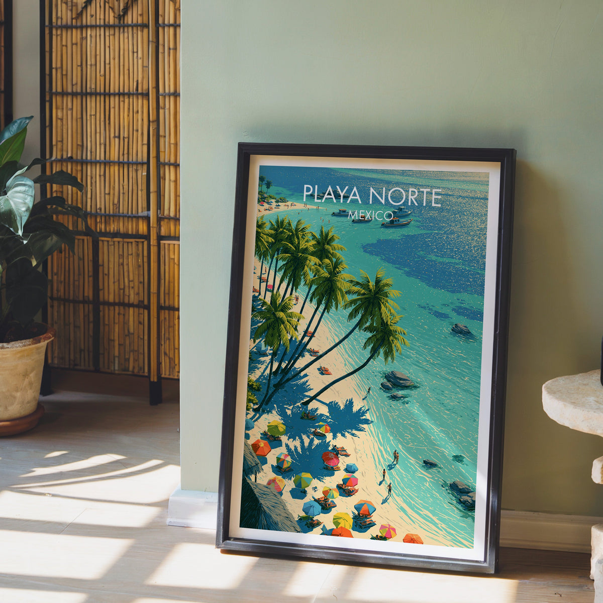 Aqua shallows and rock patches, black frame leaning on a pale wood floor against a sage-green wall.