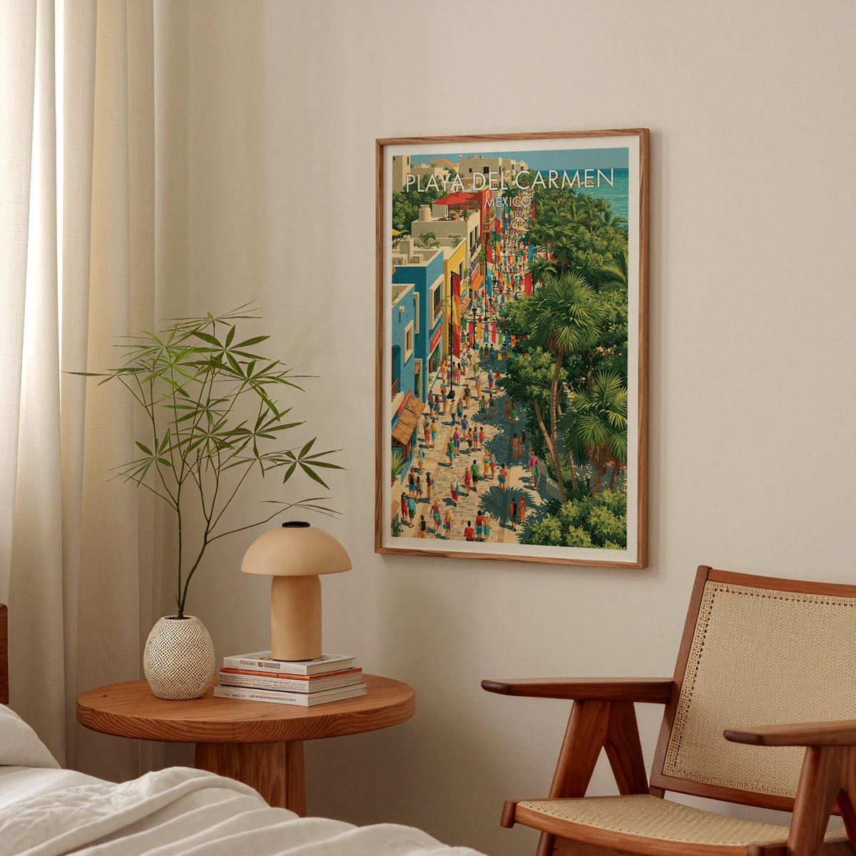 Colourful Mexican street art in an oak frame above a bedside table with a mushroom lamp and bamboo stems.